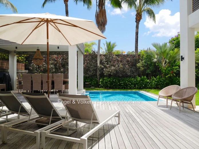Elegant Four-Bedroom Villa with Private Beach Access