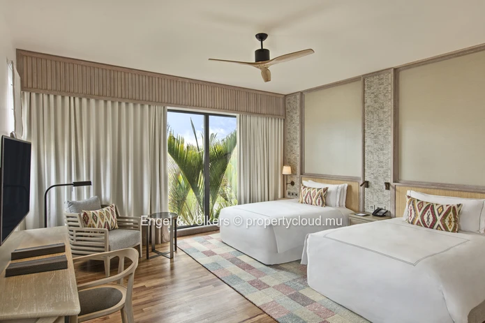 Own a Slice of Heaven with this 4-Bed Tropical Villa with Hotel Access close to Blue Bay