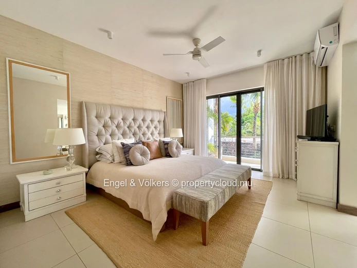 Elegant Four-Bedroom Villa with Private Beach Access