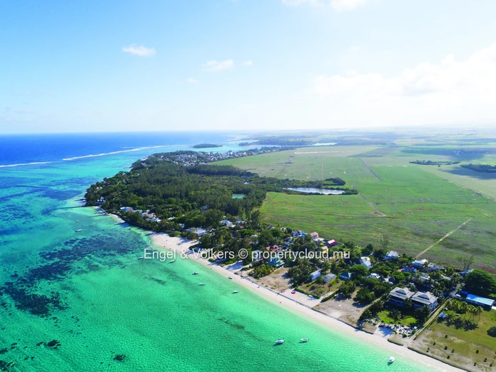High-End Duplexes in a Secure Coastal Village with Beach Access