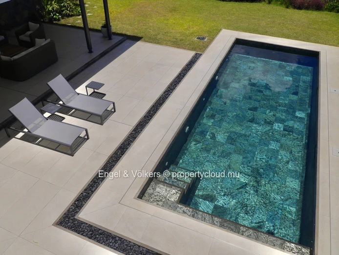 Exceptional Villa Bridging Ocean Luxury and Golfside Tranquility
