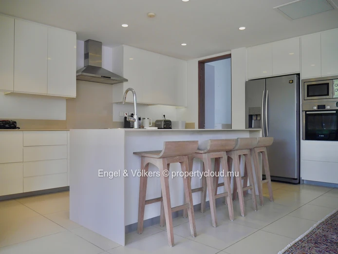 Elegant Four-Bedroom Villa with Private Beach Access