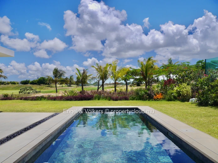 Exceptional Villa Bridging Ocean Luxury and Golfside Tranquility