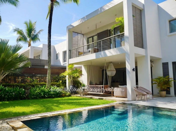 Elegant Four-Bedroom Villa with Private Beach Access
