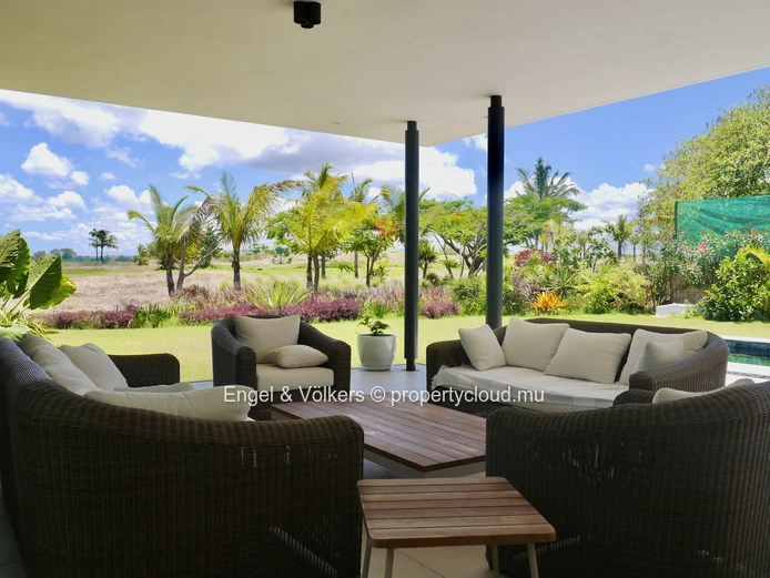 Exceptional Villa Bridging Ocean Luxury and Golfside Tranquility