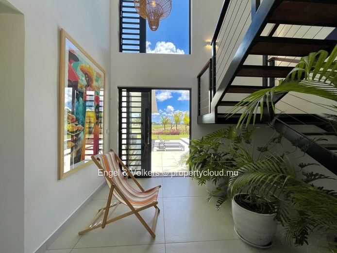 Exceptional Villa Bridging Ocean Luxury and Golfside Tranquility