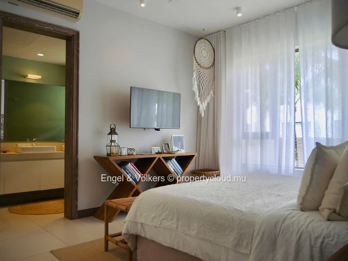 Elegant Four-Bedroom Villa with Private Beach Access